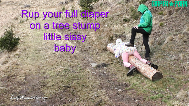 Lady Nymphodora - Pampered babe rubbing his full diaper against a log