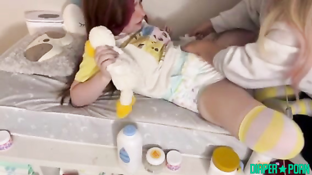 Diariesofababy - Mom interrupted her play and changed wet diaper