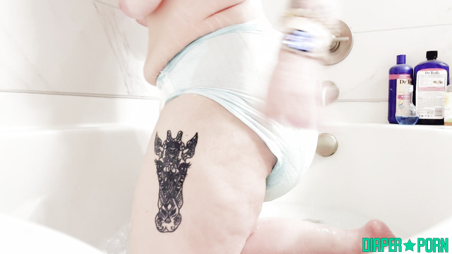 Ginger ABDL - Awkward movements in a diaper of a bbw in the bathroom
