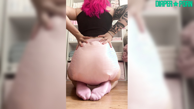 Girl with colored hair adores masturbating in full nappy