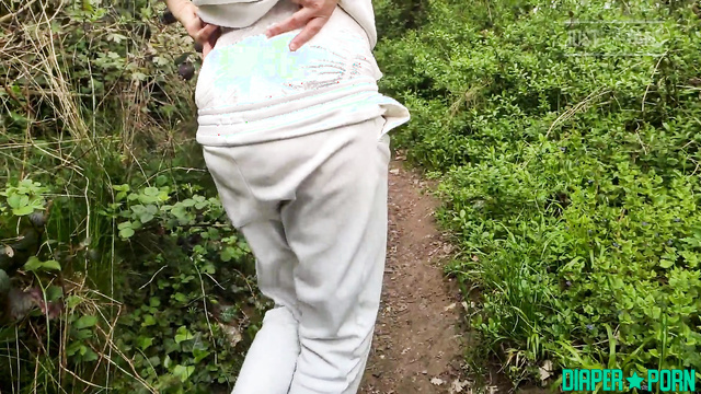 DiaperRosie - Babe pissed in pampers in the forest